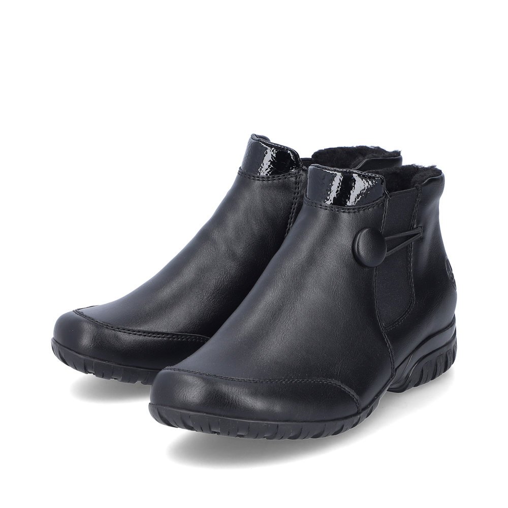 Black Rieker women´s ankle boots L4665-00 with a zipper as well as extra width H. Shoes laterally.