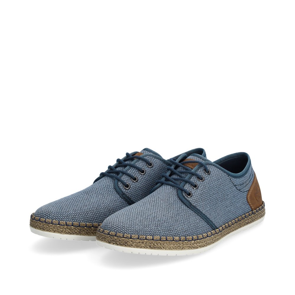 Rieker chaussures à lacets bleues hommes B5249-12 avec brodures bleues. Chaussures inclinée sur le côté.