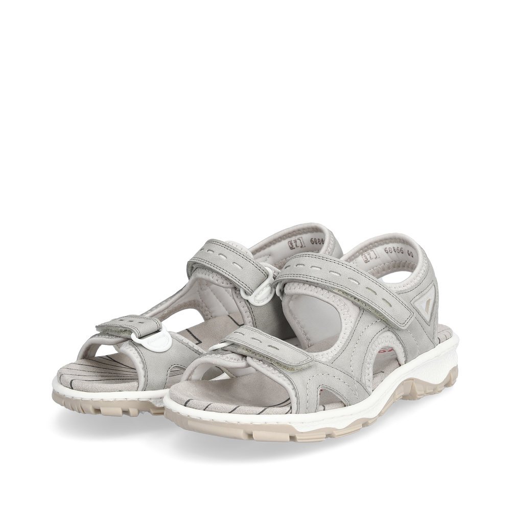 Platinum grey Rieker women´s hiking sandals 68866-40 with a hook and loop fastener. Shoes laterally.