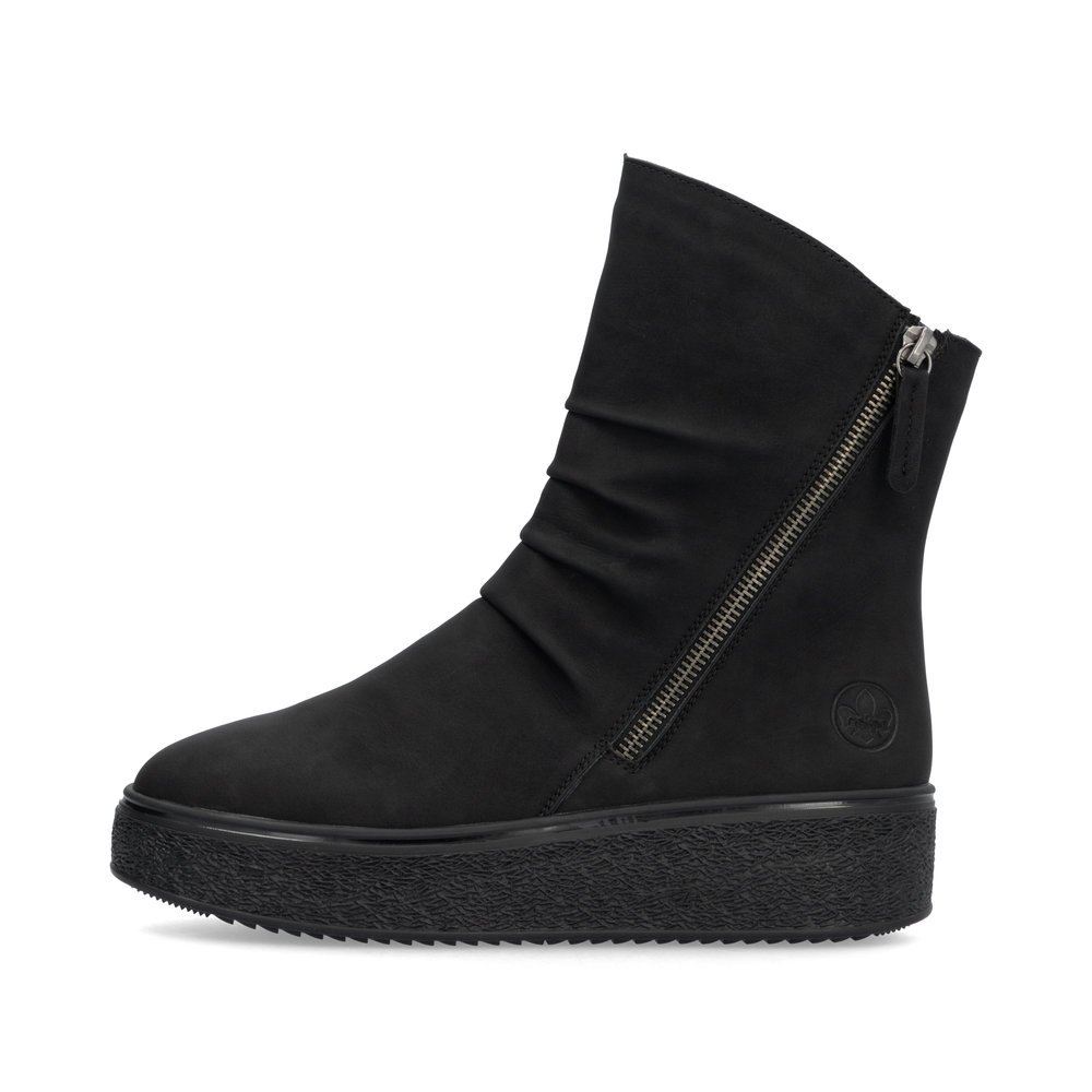 Black Rieker women´s ankle boots 78852-00 with zipper as well as a removable insole. Outside of the shoe.