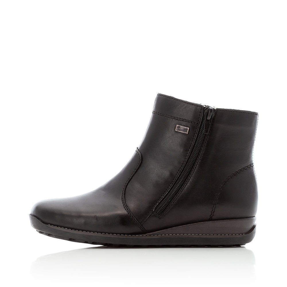 Black Rieker women´s ankle boots 98252-01 with RiekerTEX membrane as well as zipper. Outside of the shoe.