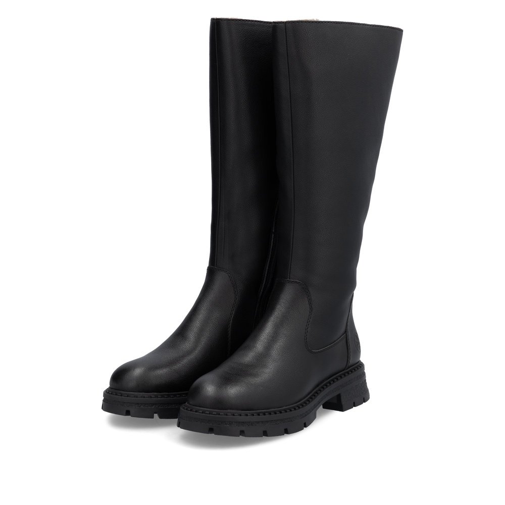 Black Rieker women´s high boots Z9856-00 with a zipper as well as removable insole. Shoes laterally.