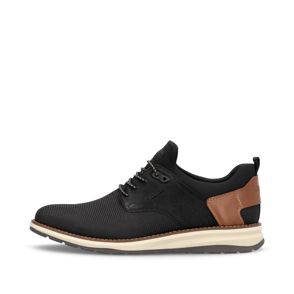 Urban black Rieker men´s slippers 14750-00 with elastic lacing. Outside of the shoe.