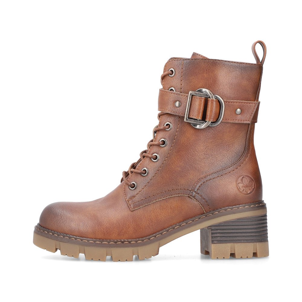 Fox brown Rieker women´s biker boots 92040-24 with a strap with decorative buckle. Outside of the shoe.