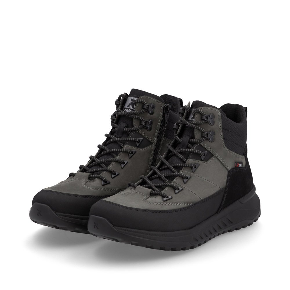 Baskets montantes Rieker grises homme U0174-42 avec membrane RiekerTEX. Chaussures inclinées sur le côté.