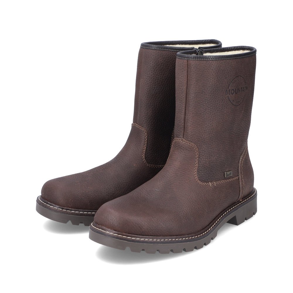 Schwarzbraune Rieker Herren Kurzstiefel 39870-25 mit griffiger Fiber-Grip Sohle. Schuhpaar seitlich schräg.