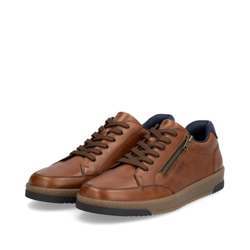 Brown Rieker men´s low-top sneakers 17502-24 with a zipper as well as extra width H. Shoes laterally.