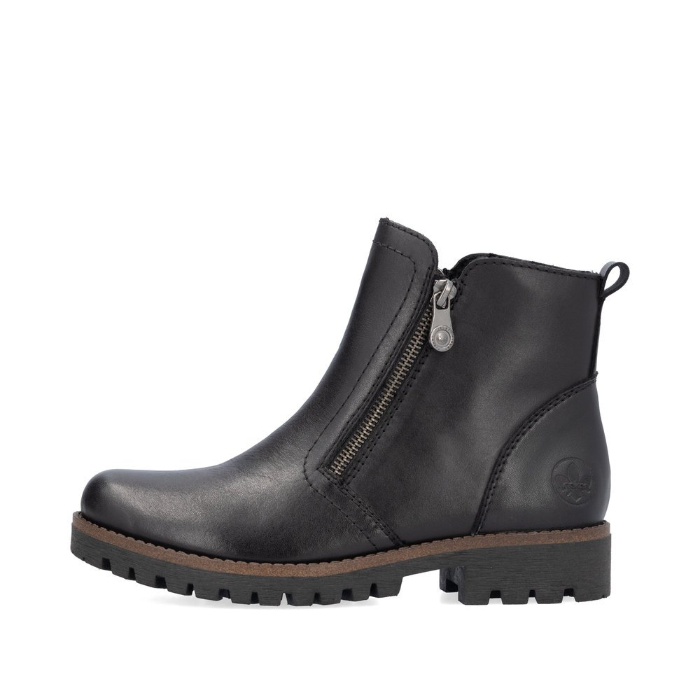 Night black Rieker women´s ankle boots 78556-00 with zipper as well as grippy sole. Outside of the shoe.