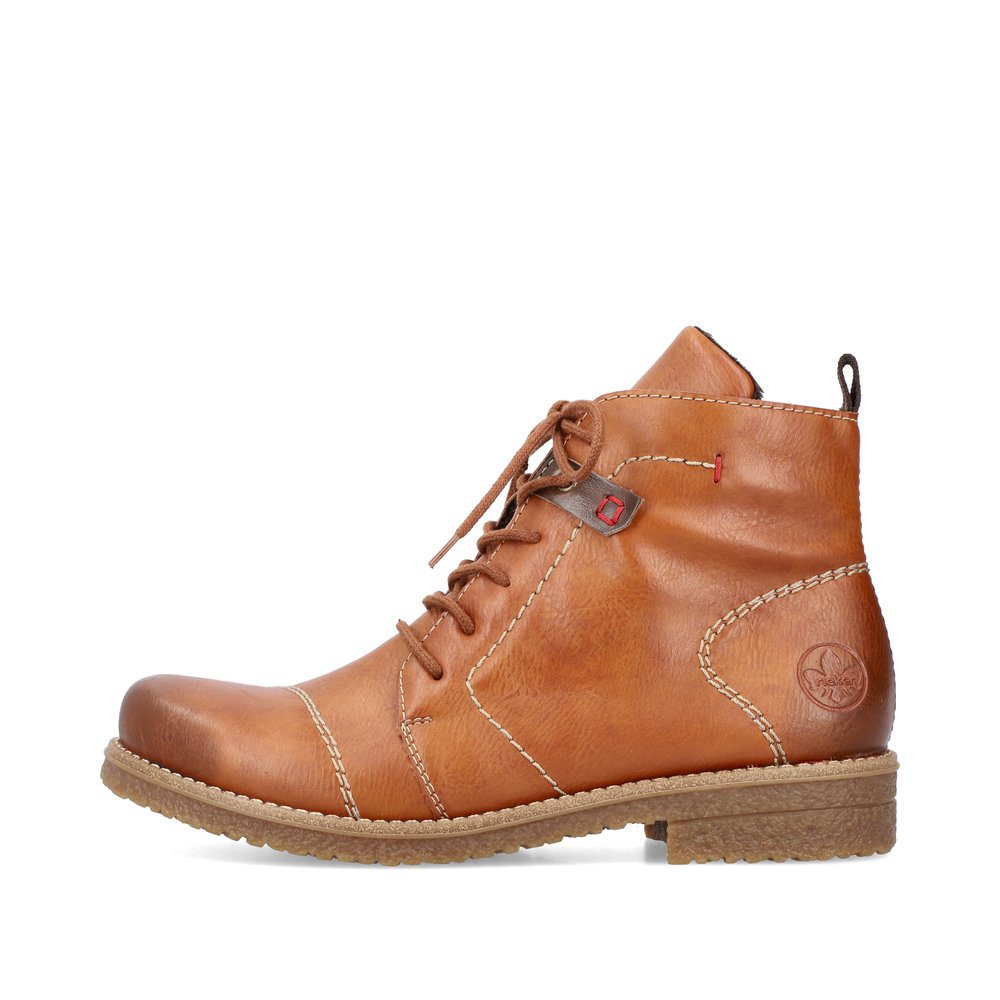 Caramel brown Rieker women´s lace-up boots 73501-24 with a zipper. Outside of the shoe.