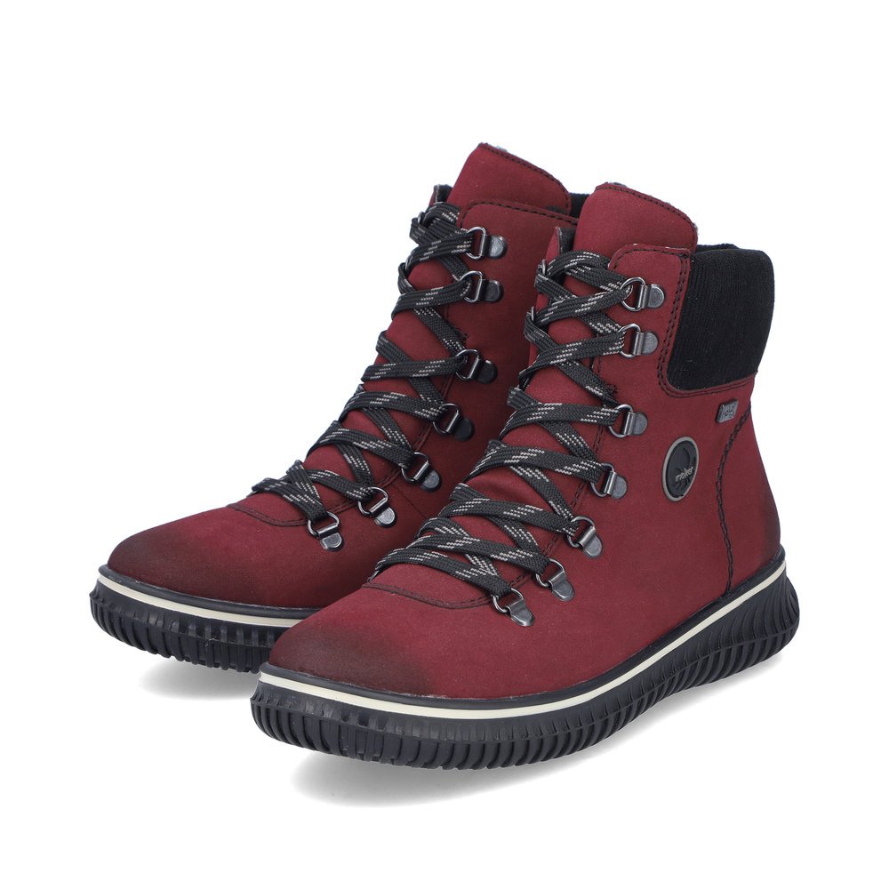 Red Rieker women´s lace-up boots 74247-35 with RiekerTEX membrane as well as zipper. Shoes laterally.