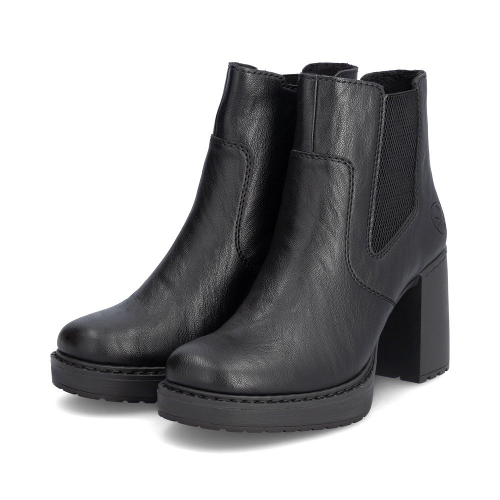 Bottines Rieker noires pour femme Y4151-00 avec fermeture éclair. Chaussures inclinées sur le côté.