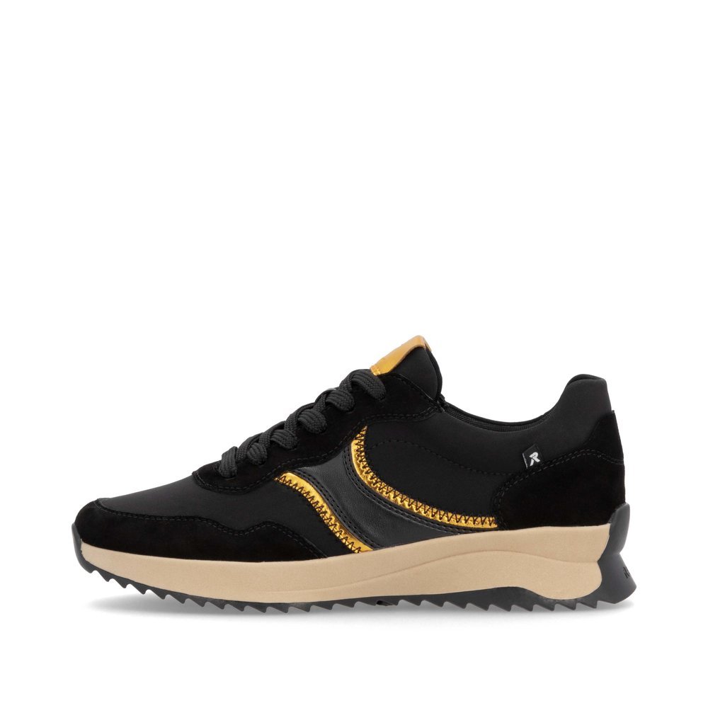 Black Rieker women´s low-top sneakers W1302-00 with durable sole as well as lacing. Outside of the shoe.