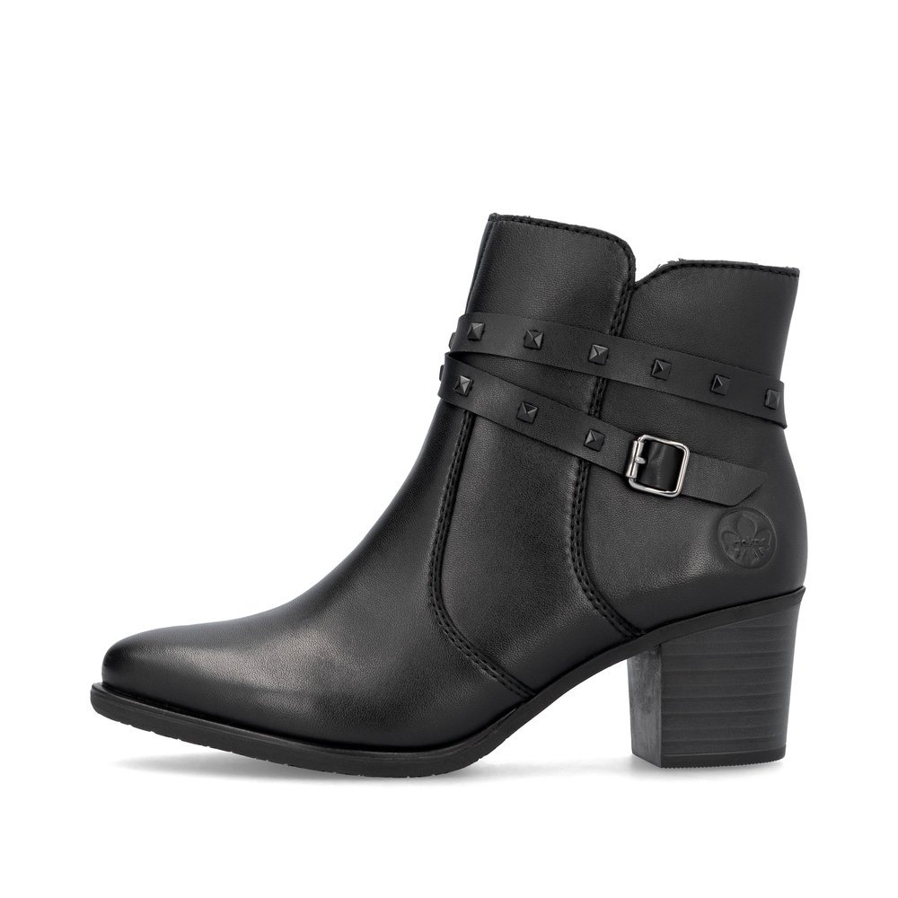 Black Rieker women´s ankle boots Y2059-00 with decorative buckle as well as zipper. Outside of the shoe.