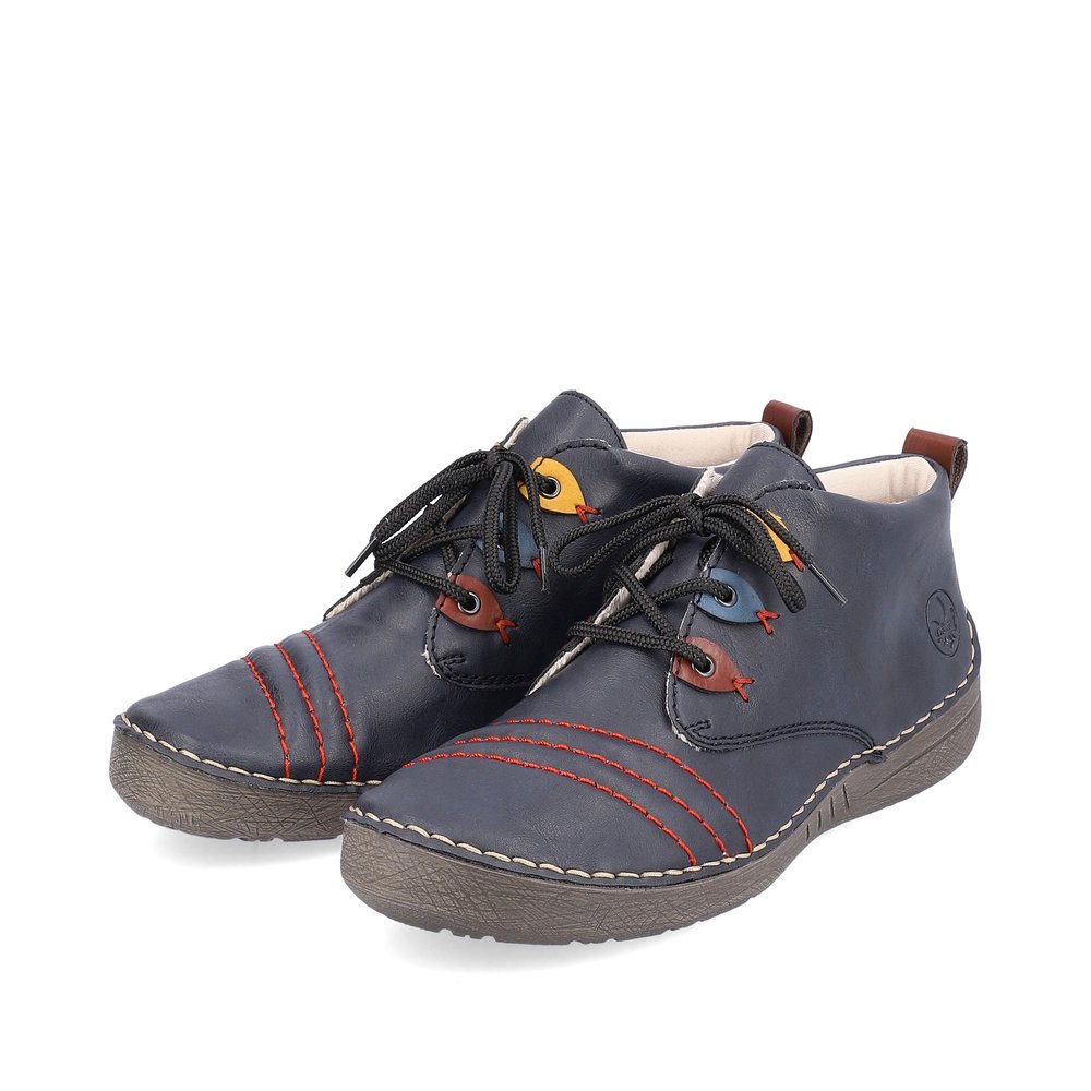 Chaussures à lacets Rieker bleues femme 52509-14 avec détails colorés. Chaussures inclinées sur le côté.