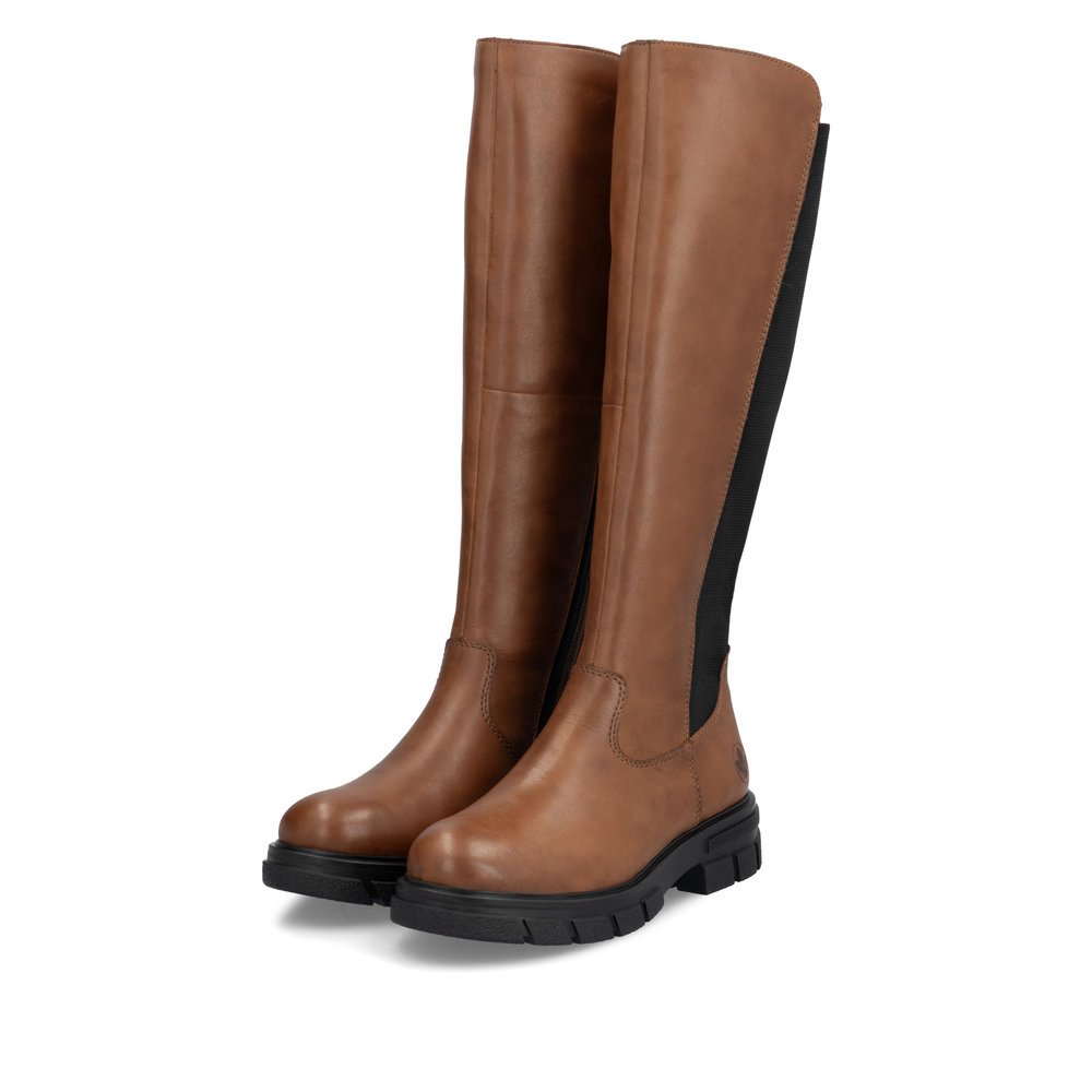 Caramel brown Rieker women´s high boots Z9158-22 with a zipper. Shoes laterally.