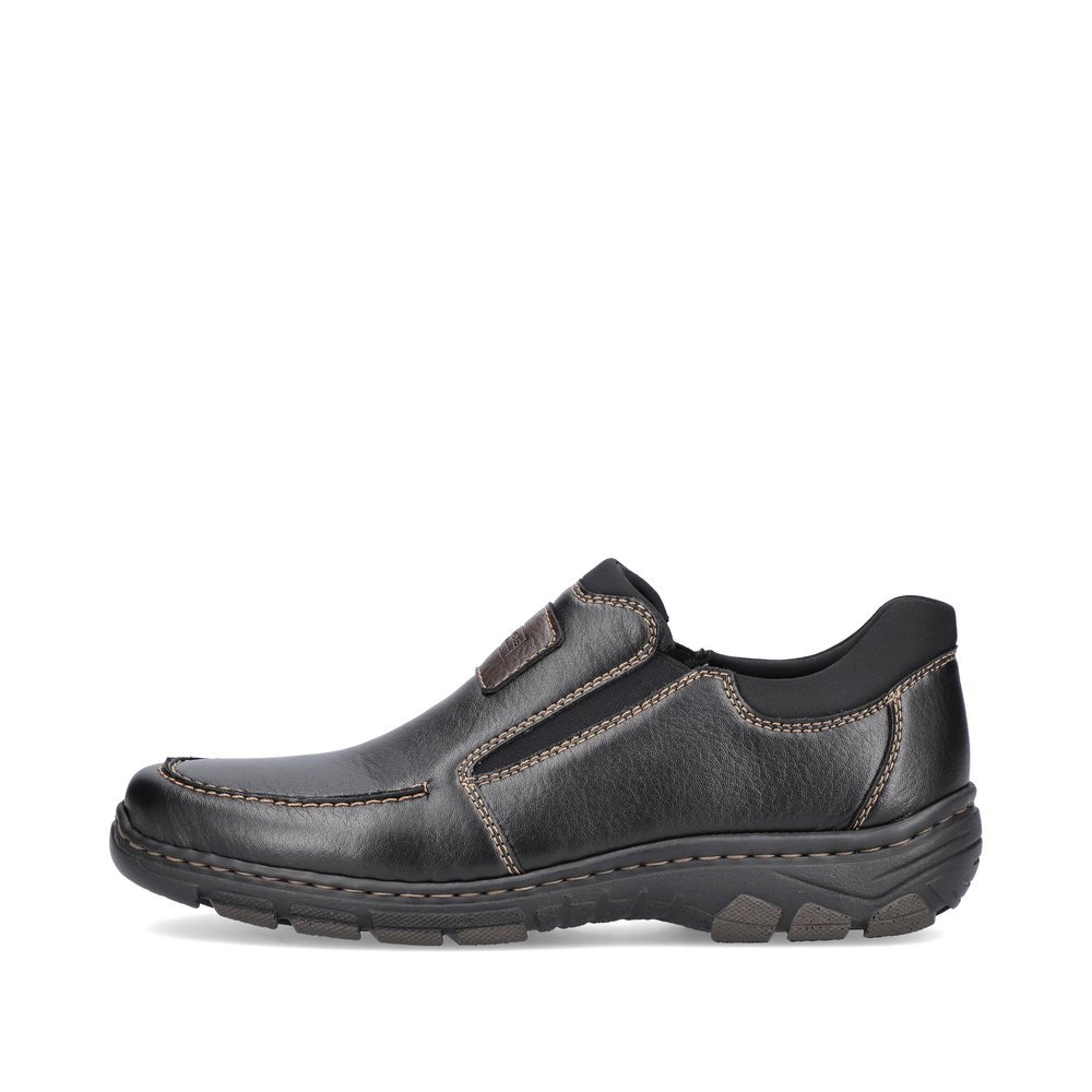 Black Rieker men´s slippers 19961-03 with elastic insert as well as comfort width G. Outside of the shoe.