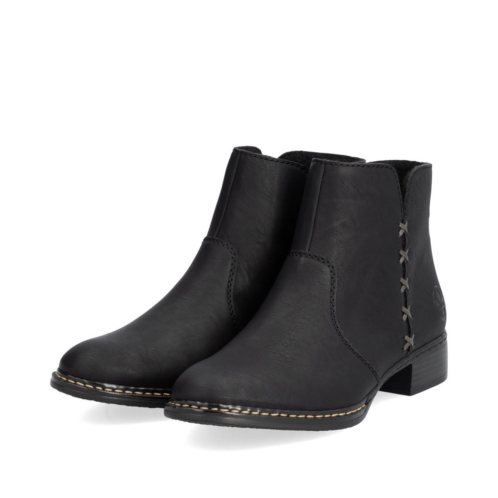 Graphite black Rieker women´s ankle boots 73475-00 with a zipper. Shoes laterally.