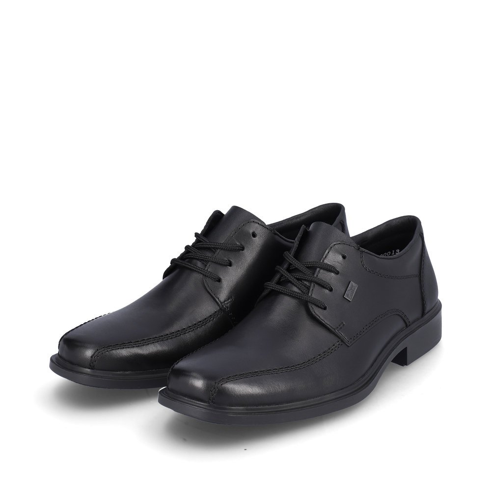 Schwarze Rieker Herren Schnürschuhe B0013-00 mit wasserabweisender TEX-Membran. Schuhpaar seitlich schräg.