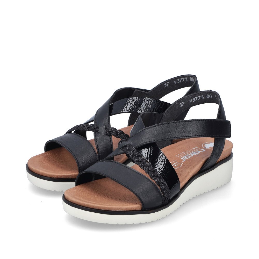 Black Rieker women´s wedge sandals V3773-00 with a hook and loop fastener. Shoes laterally.