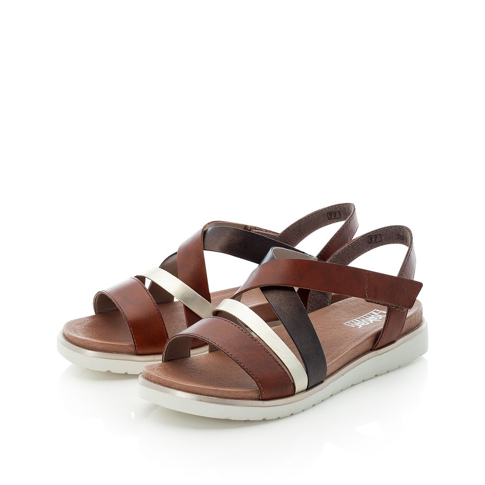 Brown Rieker women´s strap sandals V5073-24 with a hook and loop fastener. Shoes laterally.