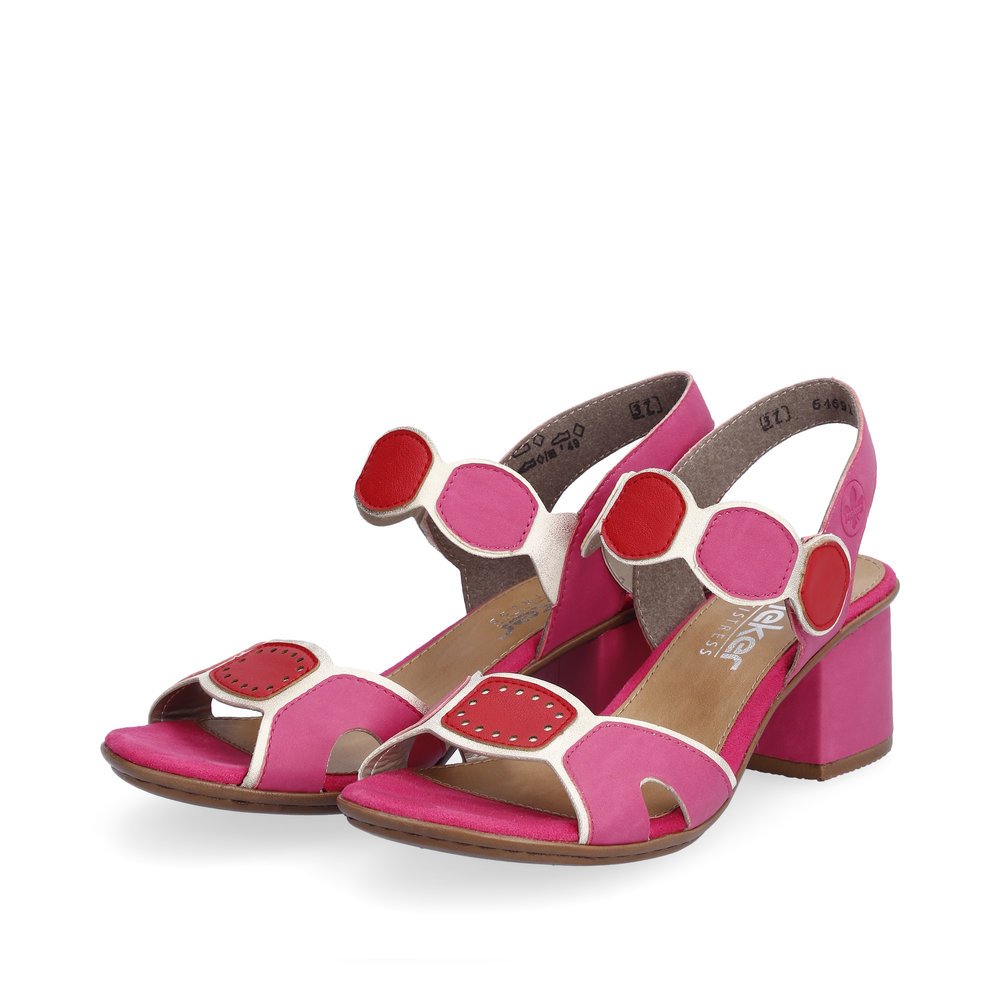 Rieker sandalettes à lanières roses femmes 64691-31 avec fermeture velcro. Chaussures inclinée sur le côté.
