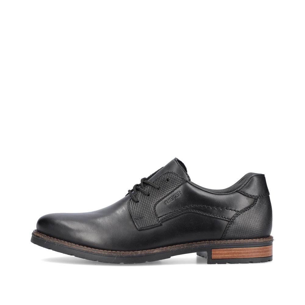 Glossy black Rieker men´s lace-up shoes 14603-00 with comfort width G 1/2. Outside of the shoe.