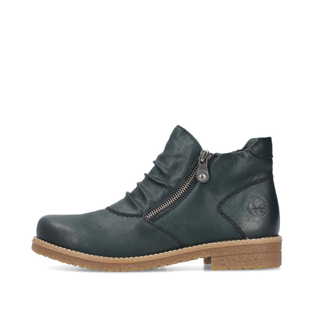 Blue-green Rieker women´s ankle boots 73553-54 with gathered look as well as zipper. Outside of the shoe.