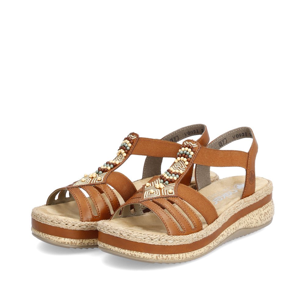 Brown Rieker women´s strap sandals V0921-24 with an elastic insert. Shoes laterally.