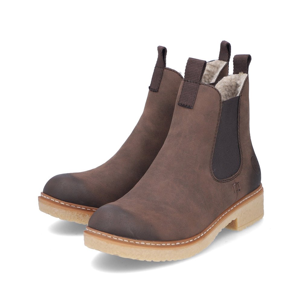 Bottes Chelseas Rieker marron pour femme Z5050-25 avec fermeture éclair. Chaussures inclinées sur le côté.