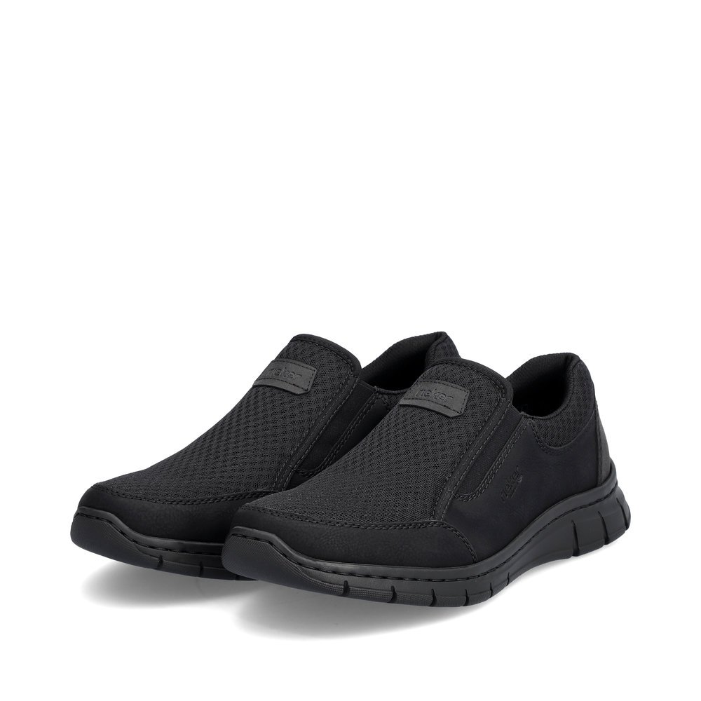 Jet black Rieker men´s slippers B7761-00 with an elastic insert. Shoes laterally.