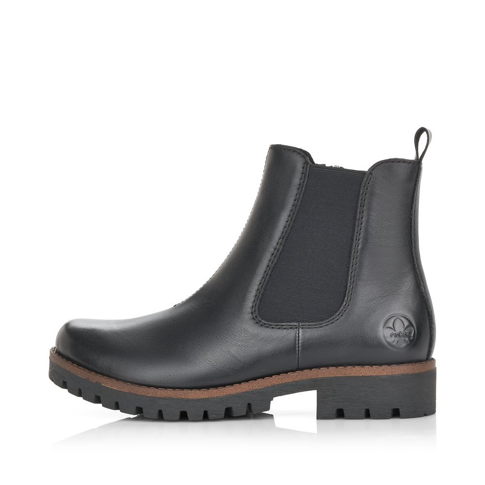 Black Rieker women´s Chelsea boots 78552-00 with a zipper as well as a grippy sole. Outside of the shoe.