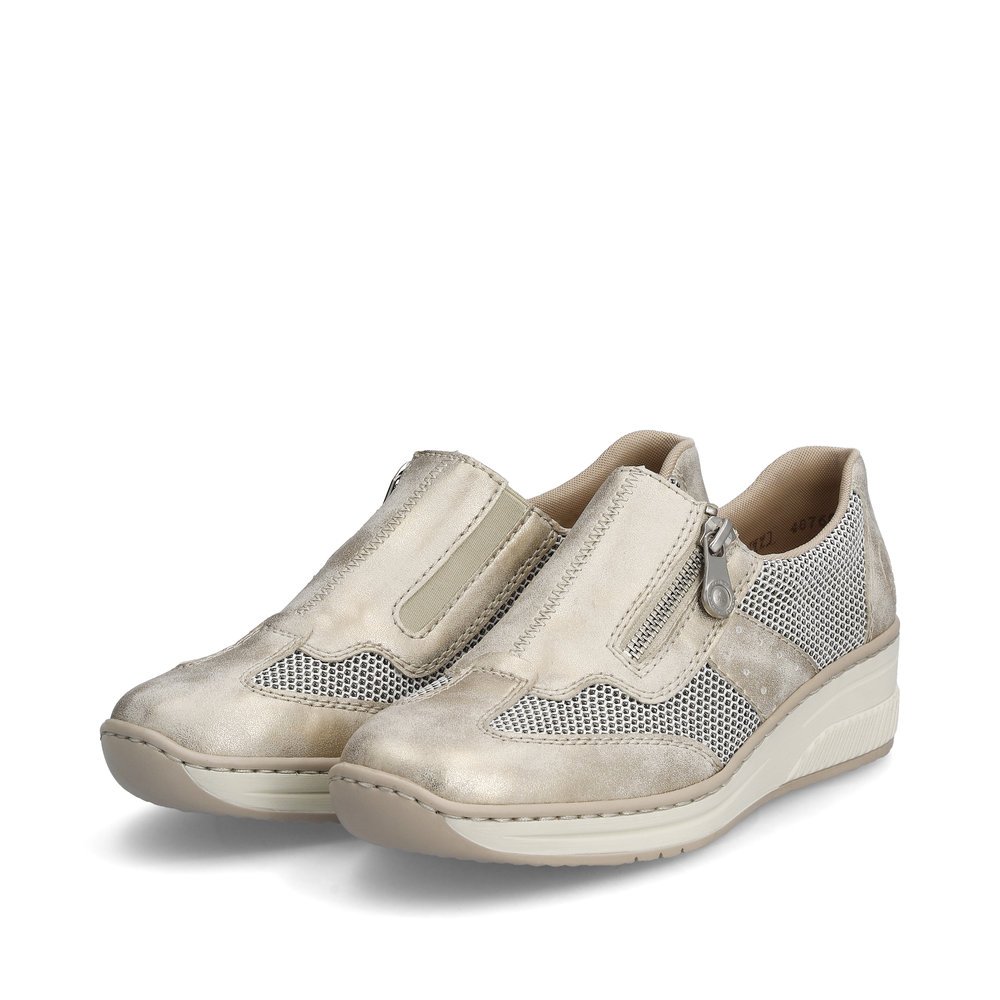 Rieker chaussons beiges pour femmes 48760-60 avec une fermeture éclair. Chaussures inclinée sur le côté.
