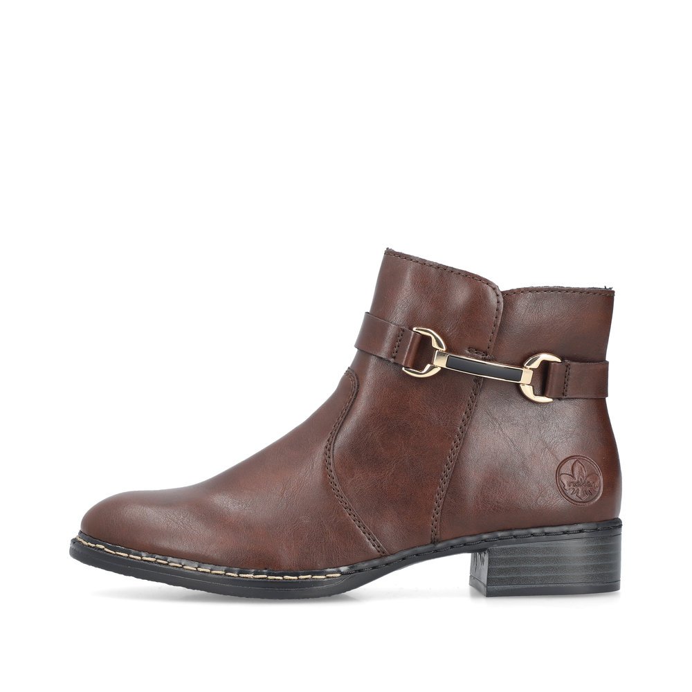 Brown Rieker women´s ankle boots 73487-25 with decorative element as well as zipper. Outside of the shoe.