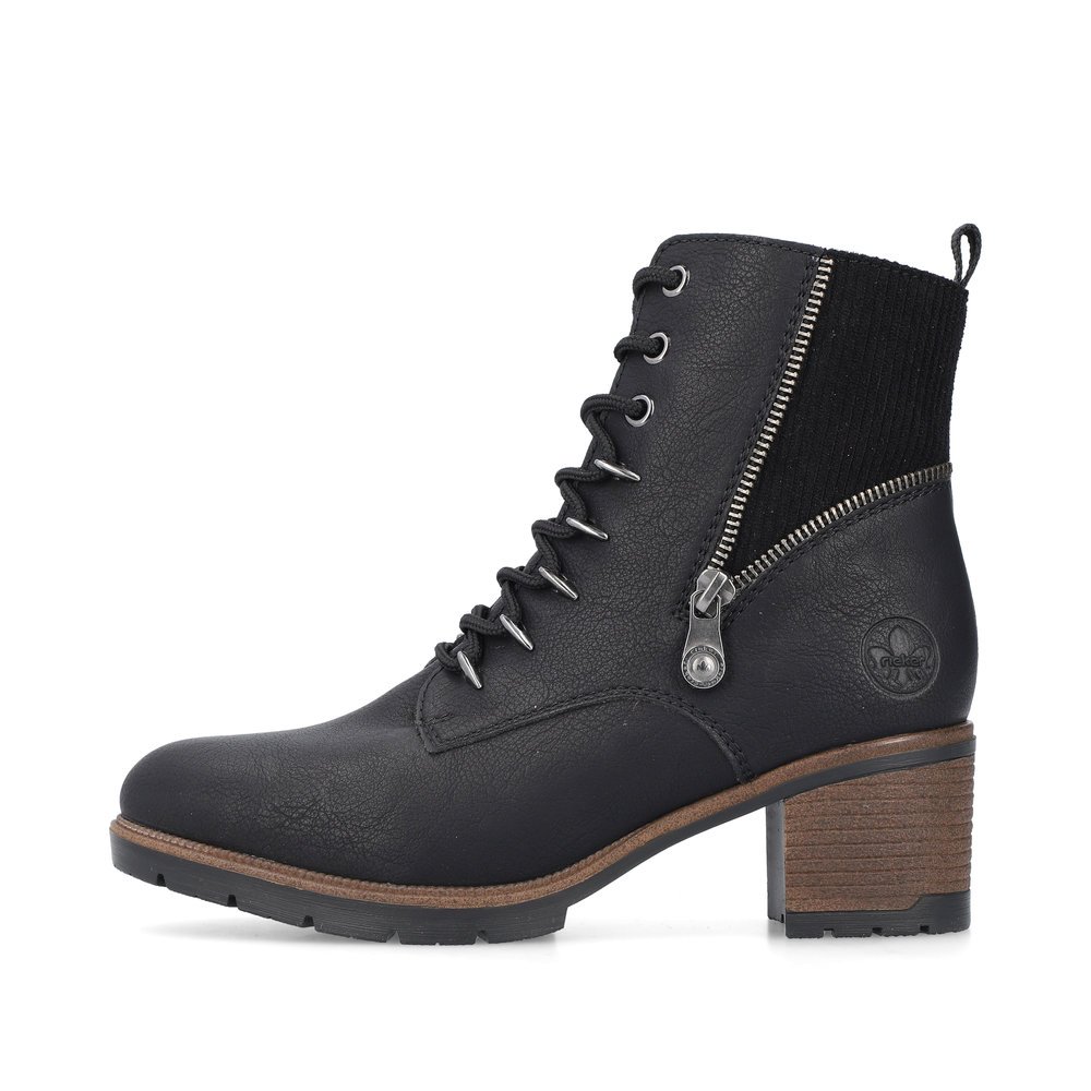 Stahlschwarze Rieker Damen Schnürstiefel 77520-00 mit dekorativem Zipper. Schuh Außenseite.