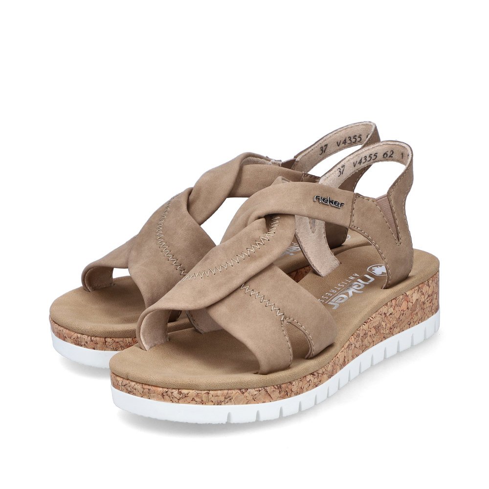 Brown Rieker women´s wedge sandals V4355-62 with an elastic insert. Shoes laterally.