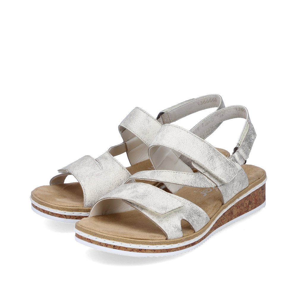 Silver Rieker women´s wedge sandals V3666-60 with a hook and loop fastener. Shoes laterally.