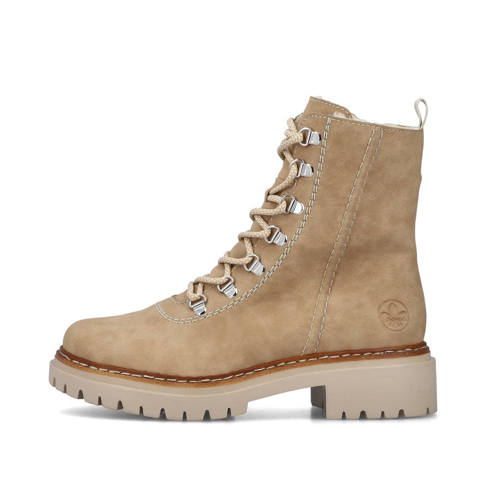 Brown beige Rieker women´s lace-up boots 72643-60 with a zipper. Outside of the shoe.