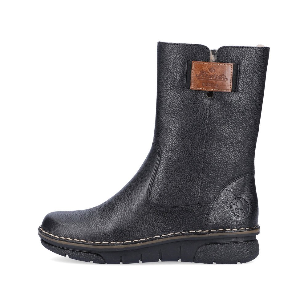 Black Rieker women´s ankle boots 73350-00 with zipper as well as a removable insole. Outside of the shoe.