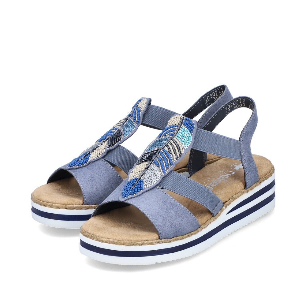 Rieker sandales compensées bleues femmes V0207-12 avec insert élastique. Chaussures inclinée sur le côté.