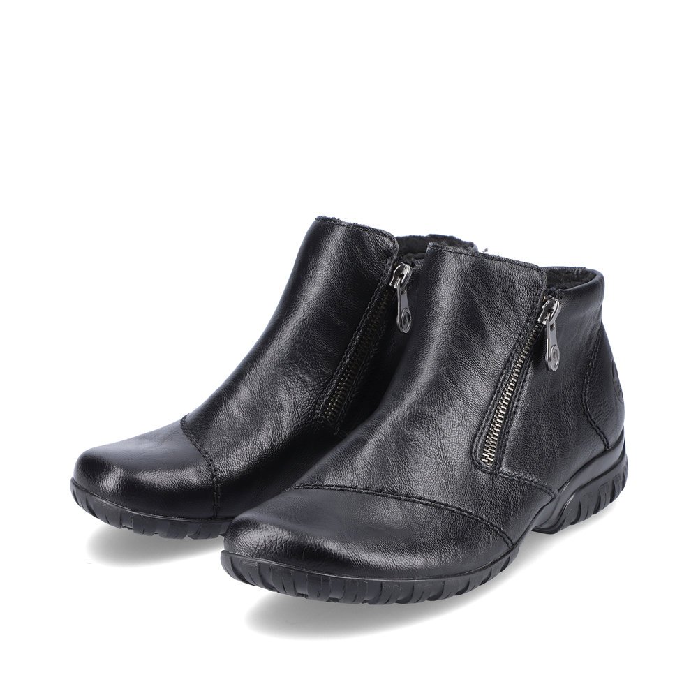 Black Rieker women´s ankle boots L4663-01 with a zipper as well as extra width H. Shoes laterally.