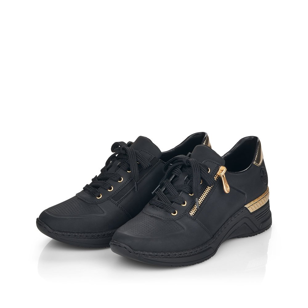 Black Rieker women´s lace-up shoes N4305-00 with a golden details as well as zipper. Shoes laterally.