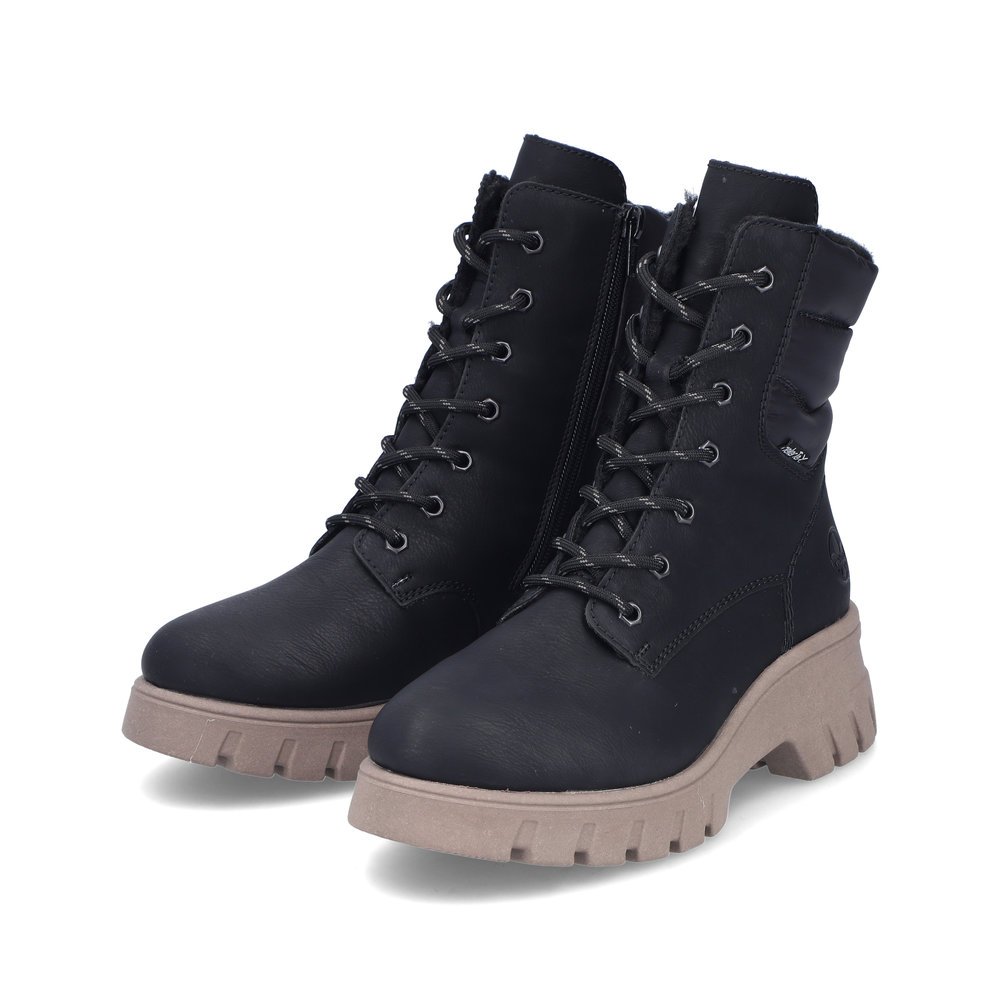 Black Rieker women´s biker boots 71831-00 with RiekerTEX membrane as well as zipper. Shoes laterally.