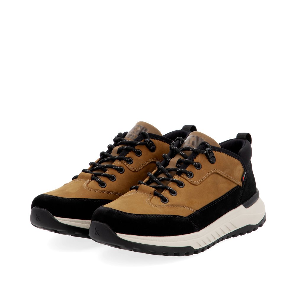 Baskets basses Rieker marron pour homme U0102-68 avec membrane RiekerTEX. Chaussures inclinées sur le côté.