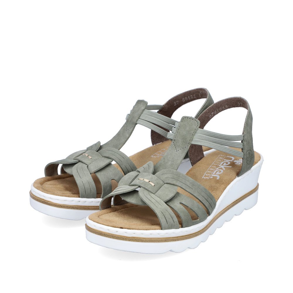 Rieker sandales compensées vertes femmes 67459-52 avec insert élastique. Chaussures inclinée sur le côté.