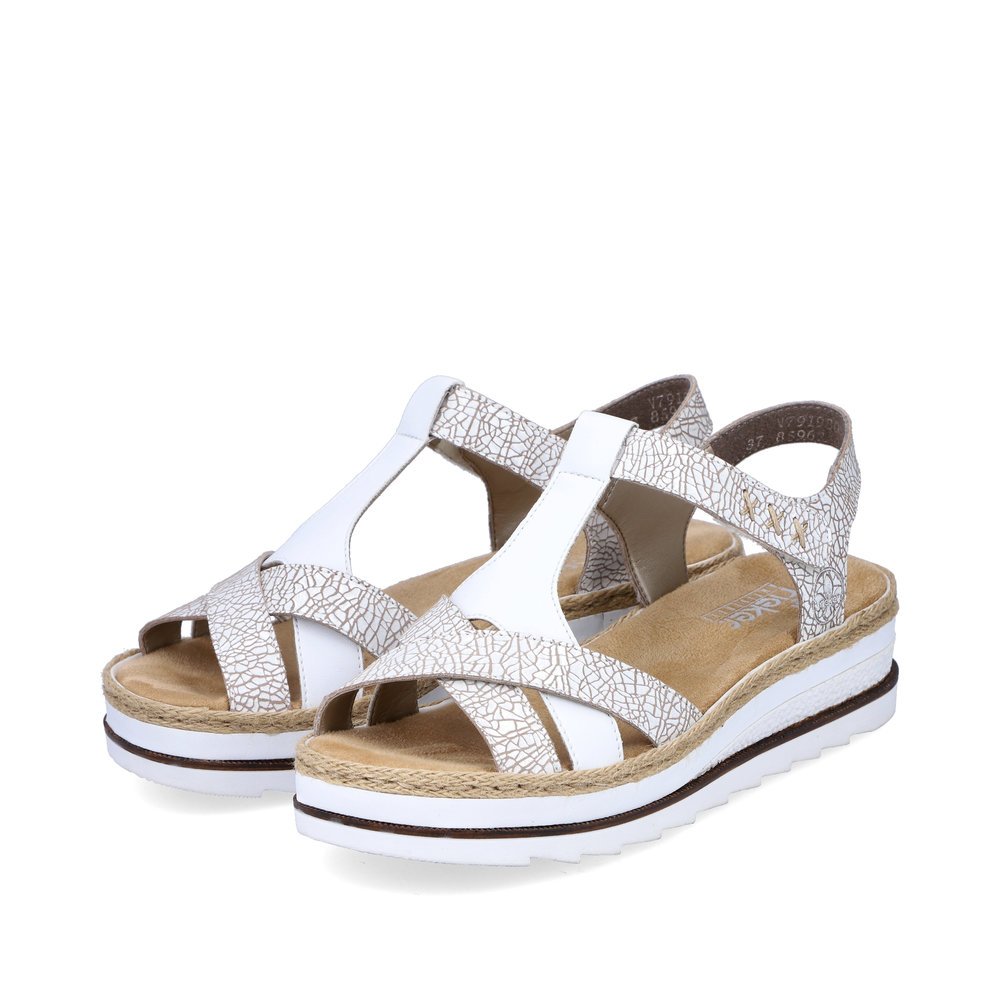 White Rieker women´s wedge sandals V7919-80 with a hook and loop fastener. Shoes laterally.