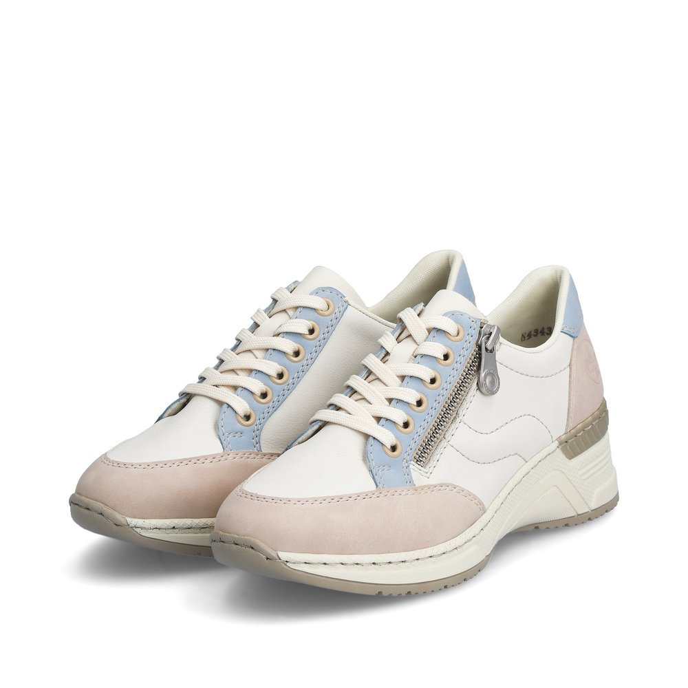 Snow white Rieker women´s low-top sneakers N4343-80 with a zipper. Shoes laterally.