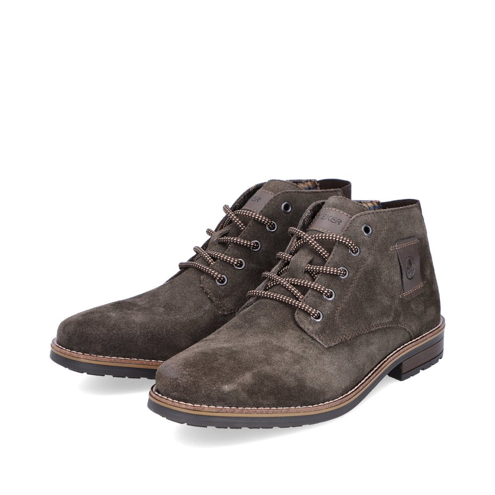 Wood brown Rieker men´s lace-up boots 33224-25 in a used look with lacing. Shoes laterally.