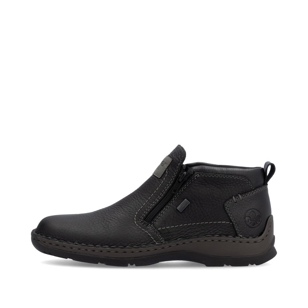 Black Rieker men´s ankle boots 05357-00 with RiekerTEX technology as well as zipper. Outside of the shoe.