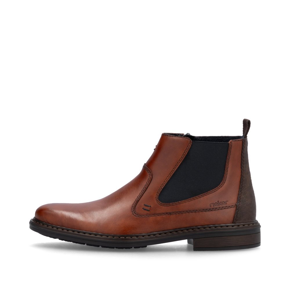 Brown Rieker men´s Chelsea boots 17654-22 with a zipper as well as extra width H. Outside of the shoe.