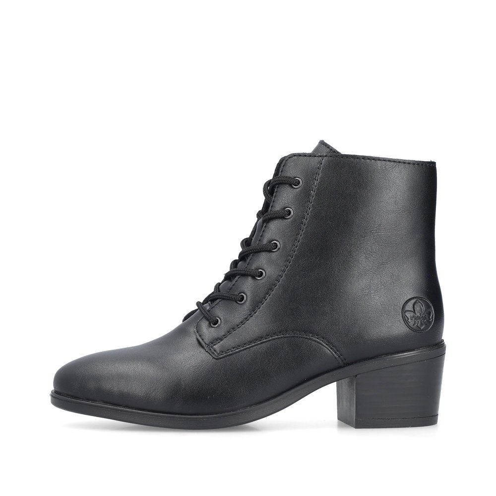 Midnight black Rieker women´s ankle boots 73930-00 with a zipper. Outside of the shoe.